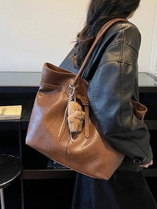 Brown large capacity PU leather tote bag with a cute plush dog pendant charm