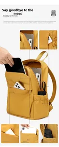 Detail view of yellow Oxford backpack featuring multiple storage compartments and padded laptop sleeve