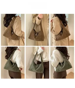 Model wearing vintage style shoulder bag in coffee brown and olive green matte suede