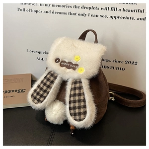 Close-up of plush rabbit ears and checkered lining on the stylish plush backpack
