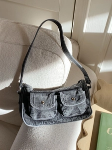 Vintage black washed denim shoulder bag with dual utility pockets and large capacity