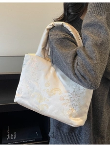 White satin shoulder bag with vintage Chinese dragon embroidery and quilted padded texture