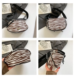 Detailansichten der Satteltasche mit Zebramuster und verstellbarem Schultergurt