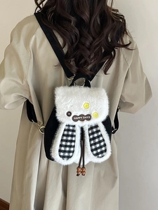 Cute bunny ear plush backpack in black and white with a stylish Happy Days label