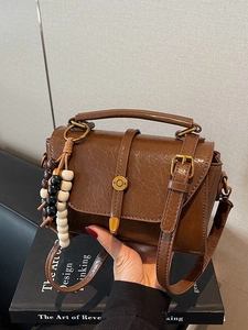 Retro brown leather crossbody square bag with wooden bead charm and top handle