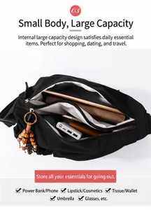 Interior view of black nylon crossbody bag showing spacious compartments and storage