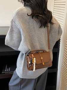 Vintage brown leather crossbody bag for women with colorful beaded tassel pendant