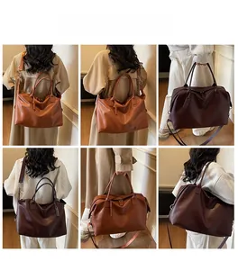 Multiple ways to wear the large tote bag showing shoulder, crossbody, and handheld styles