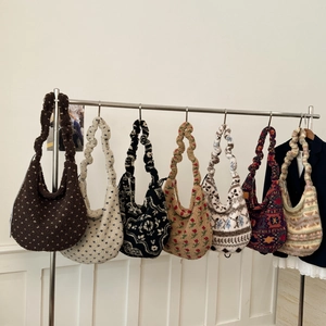 Detailed collection of plush hobo bags in seven diverse faux fur patterns and autumn colors