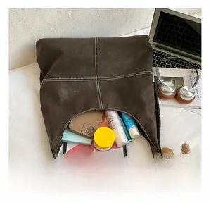 Spacious tote bag interior view with stitched detail showing daily essentials storage