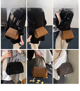 Detail view of suede chain shoulder bag in multiple colors for daily commute outfits