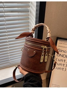 Retro brown cylinder bucket bag with leopard print scarf and adjustable shoulder strap