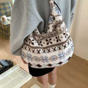 Detail of plush fuzzy tote bag with Nordic Fair Isle pattern and long shoulder straps