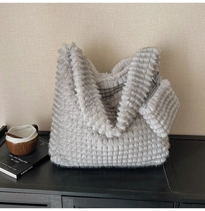 Gray plush tote bag with checkered texture detail and a matching small coin purse