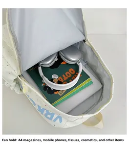 Internal view of a spacious school backpack showing capacity for A4 magazines and items