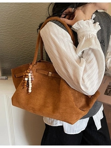Vintage brown suede tote bag with ethnic beaded tassel charm for women's daily use