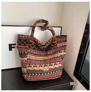 Detail of ethnic geometric pattern on plush lamb wool tote bag with Star picking label