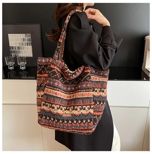 Detail of ethnic tote bag showing soft sherpa texture and colorful geometric patterns