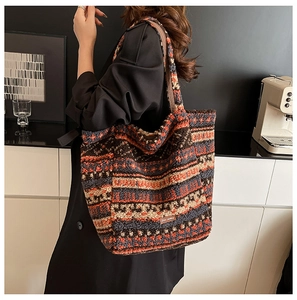 Ethnic style large tote bag in plush material featuring colorful geometric patterns