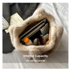 Spacious interior of beige faux fur tote showing tablet and cosmetics storage