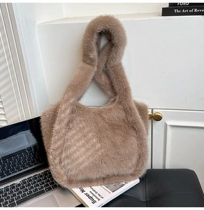 Detail of soft leopard faux fur tote bag showing plush texture and wide shoulder strap