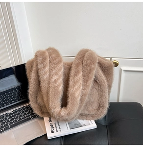 Close-up of fluffy brown faux fur tote bag showing soft plush texture and large capacity