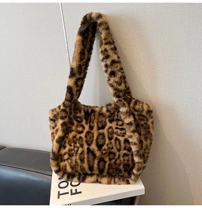 Close-up of the plush faux fur texture and bold leopard print on this stylish tote bag