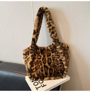 Detailed macro shot of leopard print faux fur texture and material on a large tote bag