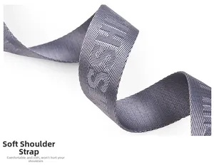 Macro view of soft grey jacquard woven strap featuring a high-density lettered texture