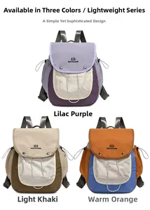 Detail view of colorful vintage backpacks with metal buckle closures and drawstring design