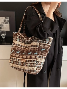 Ethnic style sherpa tote bag with geometric heart patterns and color-block design