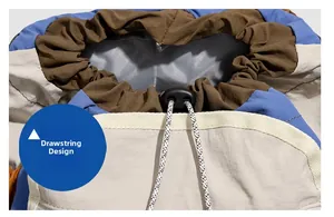 Detail view of the cinch closure with black and white drawstring on a multi-color backpack