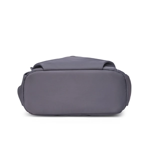 Detailed view of the dark grey nylon handbag base featuring reinforced stitching