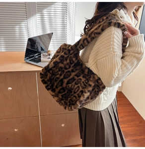 Leopard print faux fur hobo bag shown at a 45-degree angle for autumn styling