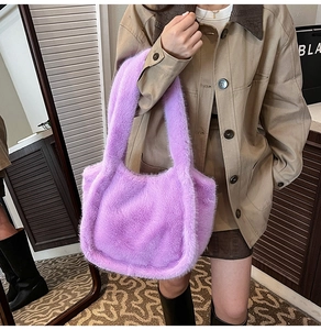Detail of soft purple faux fur tote bag showing plush texture and winter style