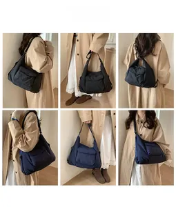 Multiple styles of large capacity nylon hobo shoulder bags in black and dark blue colors