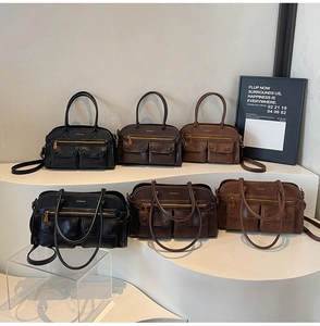 Multi-size vintage tote bags in black, dark coffee and caramel brown on display