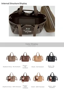 Détail du sac seau en cuir grainé avec pochette amovible et fermeture à fermoir tournant