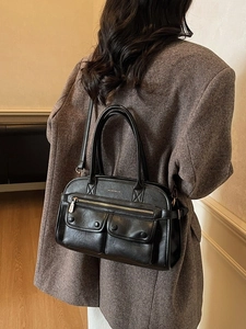 Chic black PU leather Boston tote bag with multiple pockets and adjustable shoulder strap