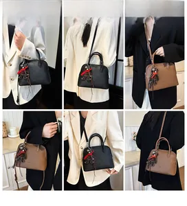 Litchi pattern shell handbags in black and brown with cute bear pendant charm details