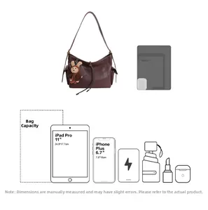 Détails de la grande capacité du sac à bandoulière marron avec des icônes