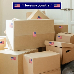 Square USA flag stickers applied to cardboard boxes for Independence Day shipping