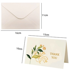 Floral watercolor fold greeting card with matching cream envelope and gold thank you text