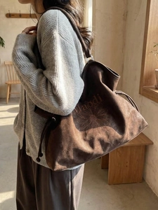 Retro oversized dark brown suede tote bag with floral embroidery and drawstring sides