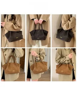 Multiple views of matte suede tote bag in grey and caramel with gold metal details