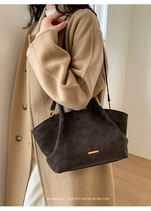 Retro tote bag shown on a model in a minimalist setting for a classic vintage look