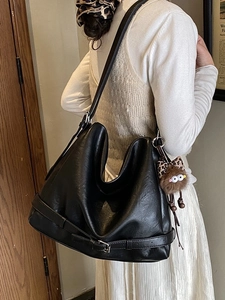 Black large capacity faux leather crossbody bag with pleated design and owl charm