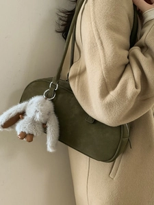 Vintage dark green suede Boston bag for women with plush rabbit charm and slim straps