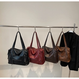 Vintage large capacity tote bags in four colors with decorative zippers and rivets