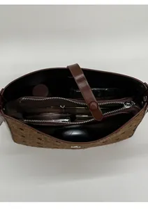 Top view showing the spacious interior with zipper compartment of this vintage bucket bag